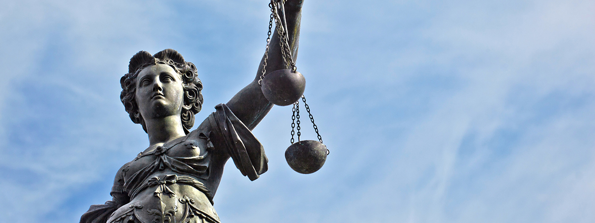 Statue of Lady Justice in front of the Romer