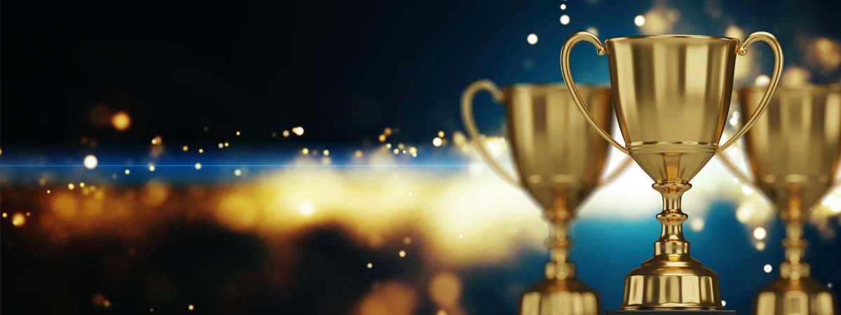 close up golden trophy award with falling confetti. copy space for text. 3d rendering.