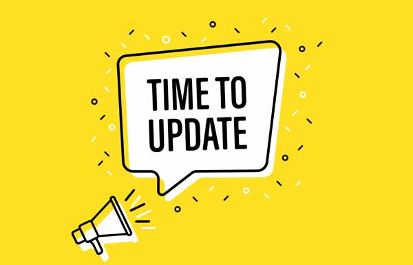 Update zur Bund-Länder-Beratung Male hand holding megaphone with time to update speech bubble. Loudspeaker. Banner for business, marketing and advertising. Vector illustration.